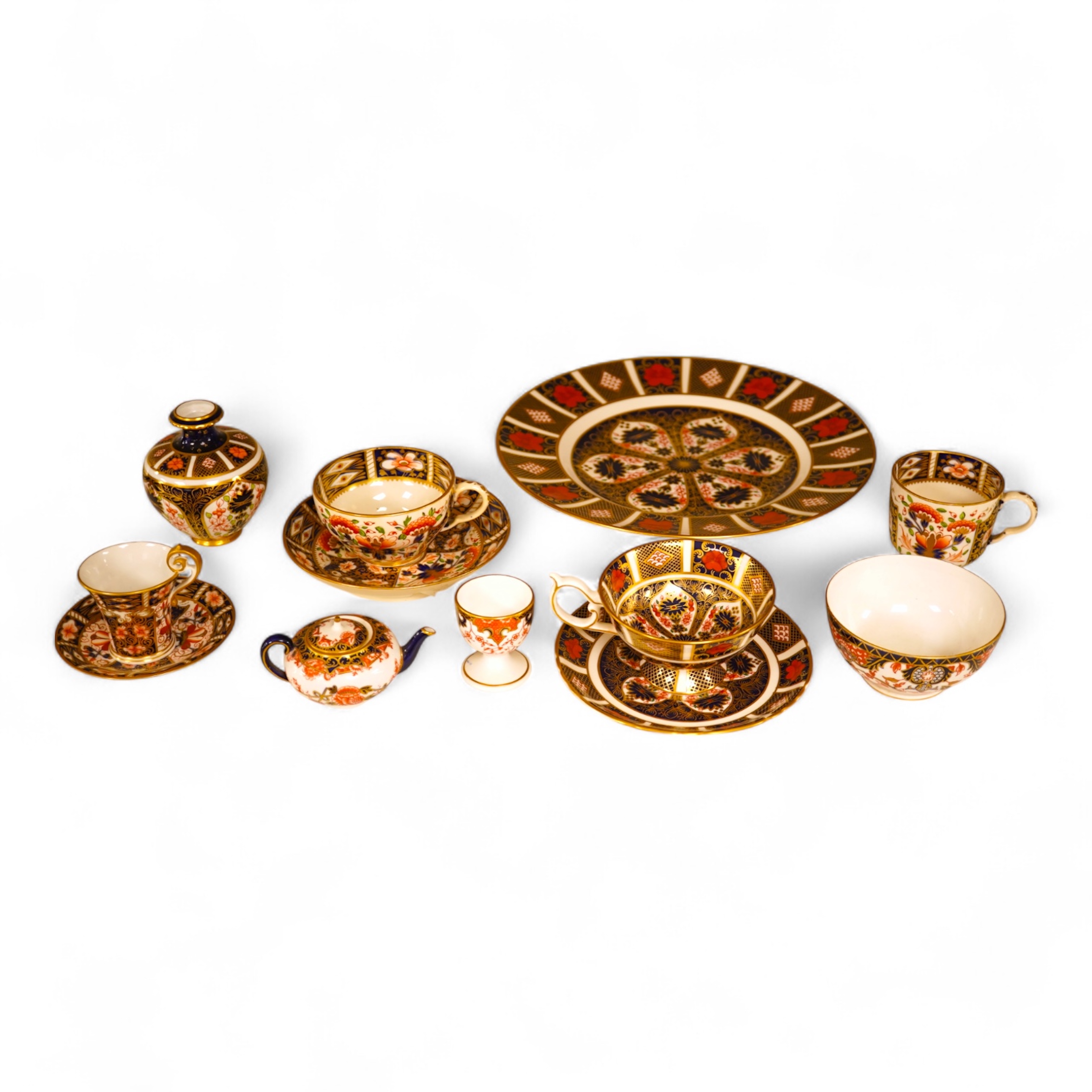 Twelve items of various patterns of Royal Crown Derby, largest item 27cm diameter